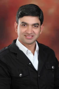 Dr. Dinesh Sharma
